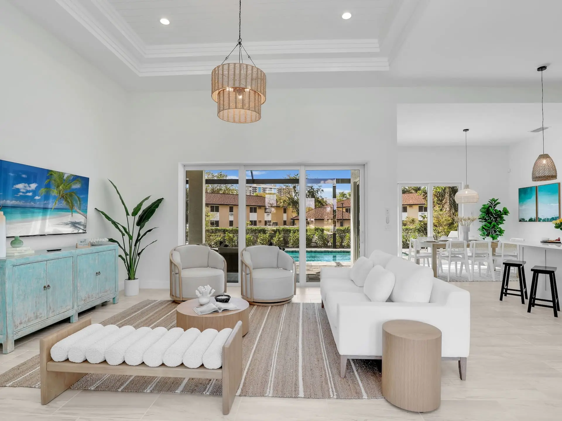 Living room with views to the lanai and the pool